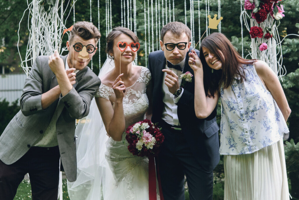 elegant stylish happy guests and bride and groom having funny photos on the background of arch, Lensley IoT Camera